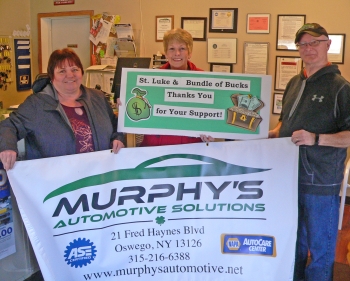 Murphy’s Automotive Solutions in Oswego Shows Their Support for St. Luke’s “Bundle of Bucks” Charity Raffle on May 5