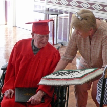 Mr Smith Recieves HS Diploma Cake at Grad Celebration St Luke Health Services 6 18