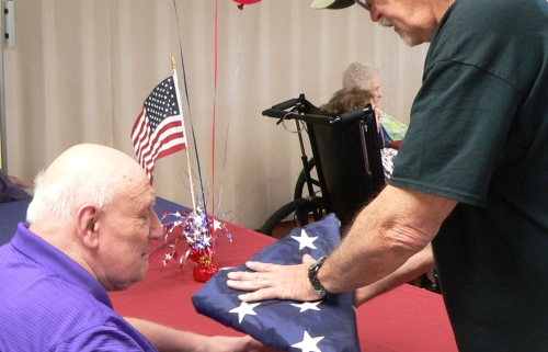 Oswego VFW Visits St. Luke On Flag Day For Flag Folding Presentation